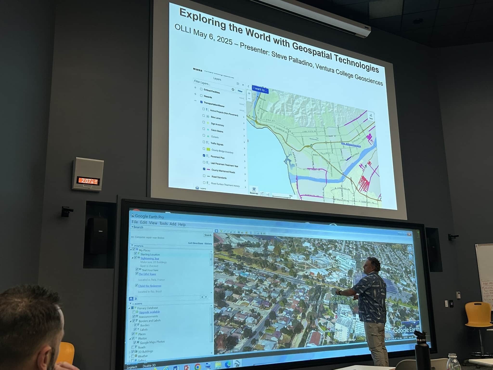 Faculty explaining about exploring the world with geo spatial technologies