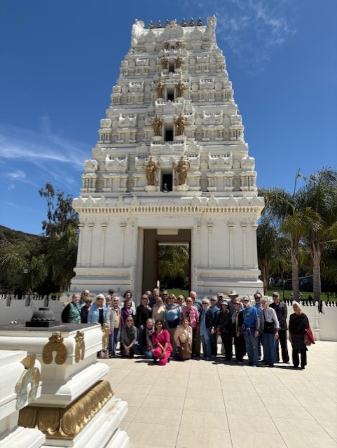 People in front of Hindu temple