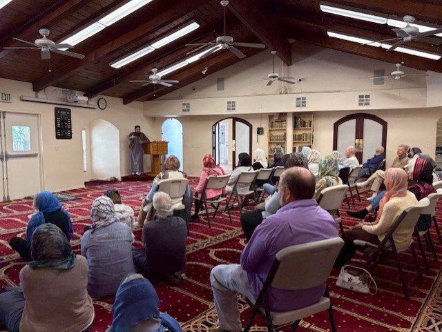 People listening to Imam(primary teacher and guide) at the mosque
