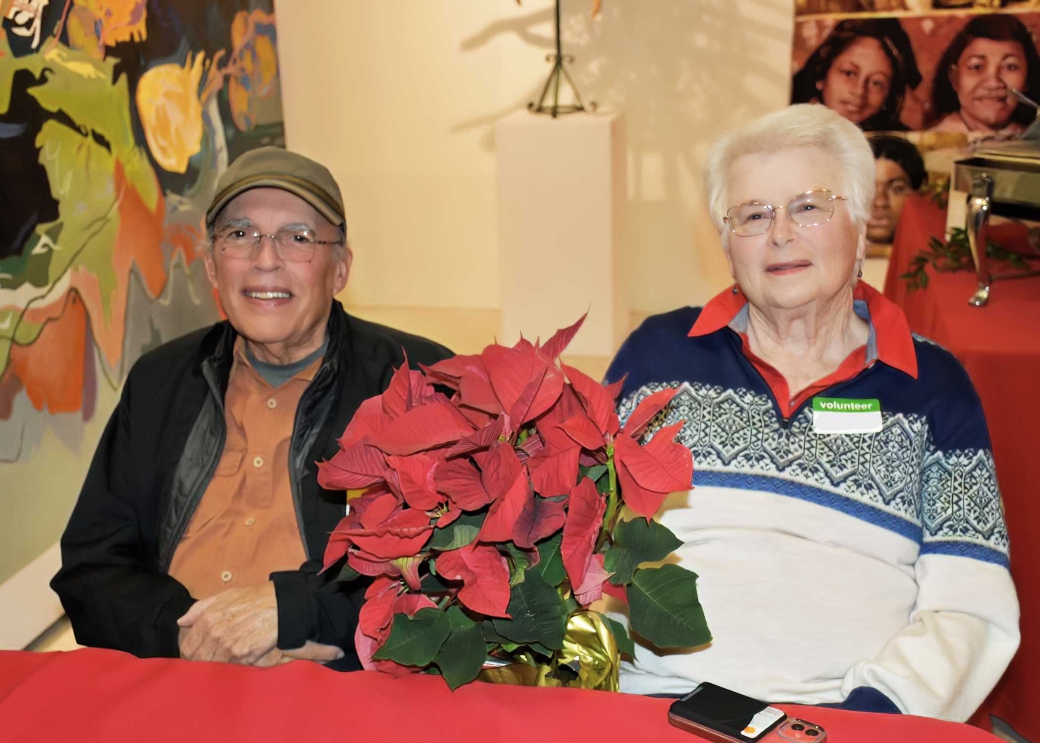 Two people sitting at table